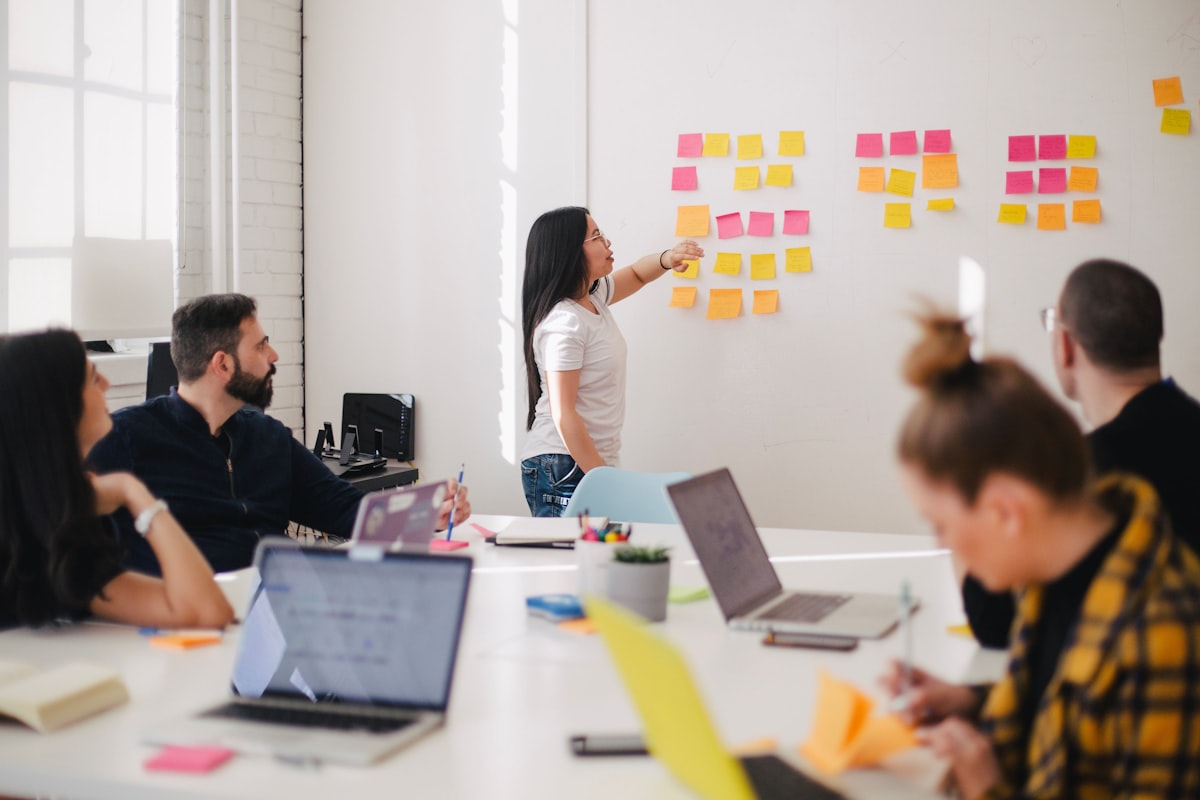 A team planning an engagement together around a meeting table